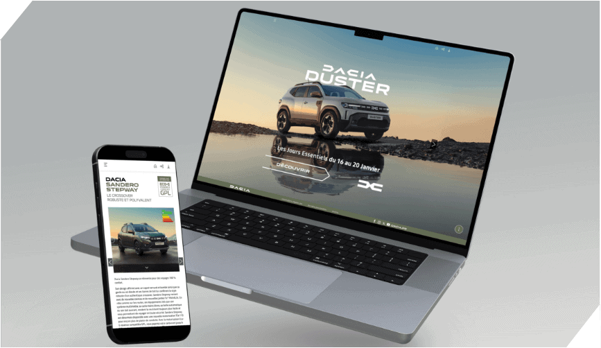 Laptop and smartphone displaying Dacia digital brochures for the Duster and Sandero Stepway models.